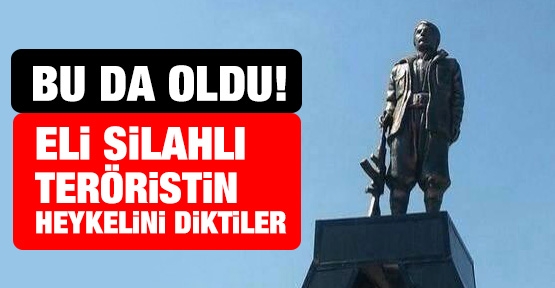 Eli silahlı teröristin heykelini diktiler